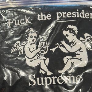 Supreme Black Tee with White Cherub Graphic